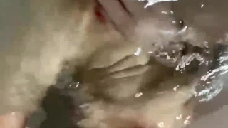 Make a girl cum by rubbing her clit while fingering her